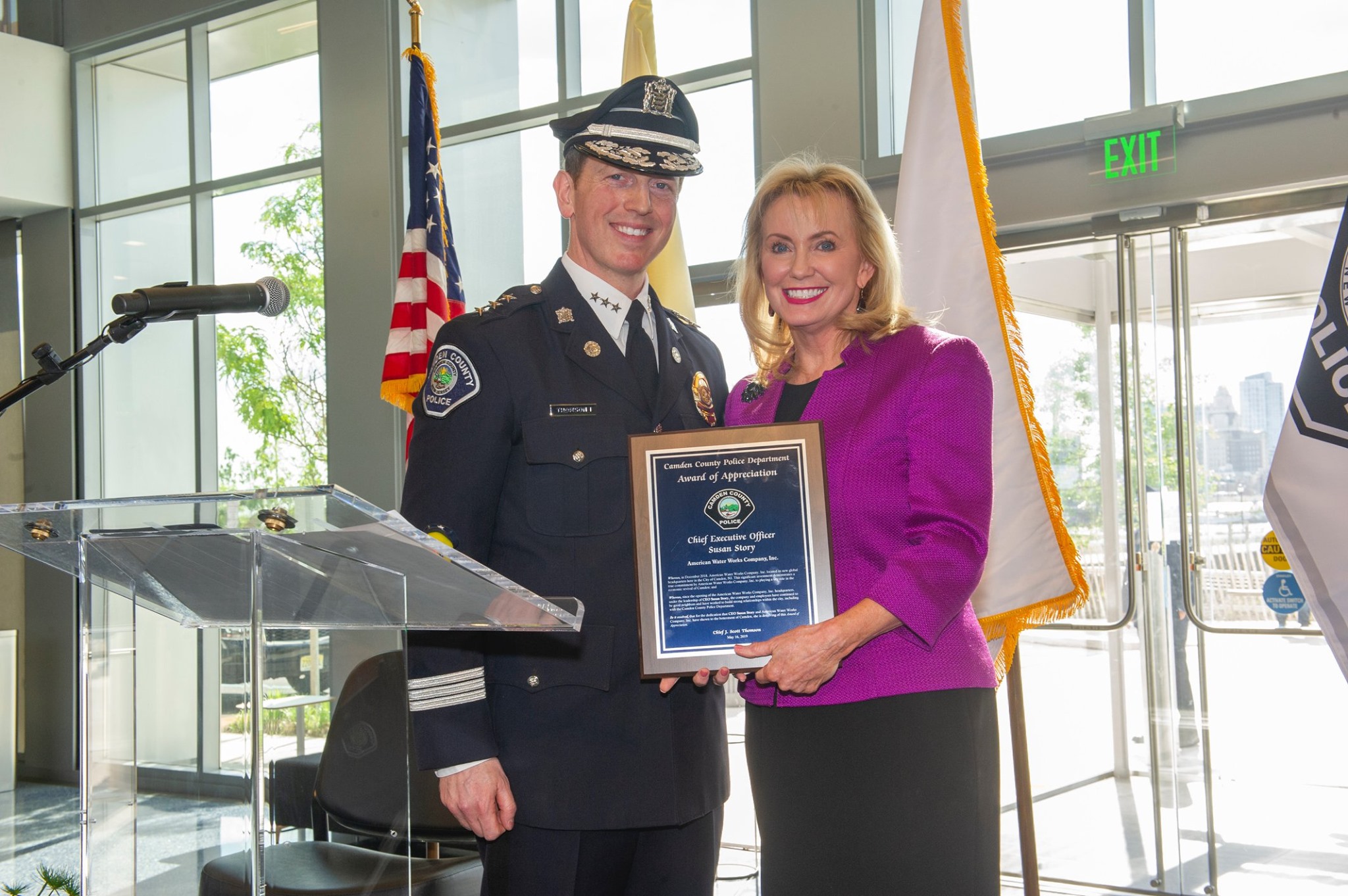 Former CEO Susan Story receives an Award of Appreciation from the local Police Department for American Water and the American Water Charitable Foundation's generous donation.
